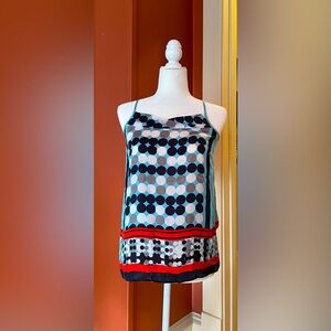 CAbi multi colored blues, white and red pattern tank top. Size XS.